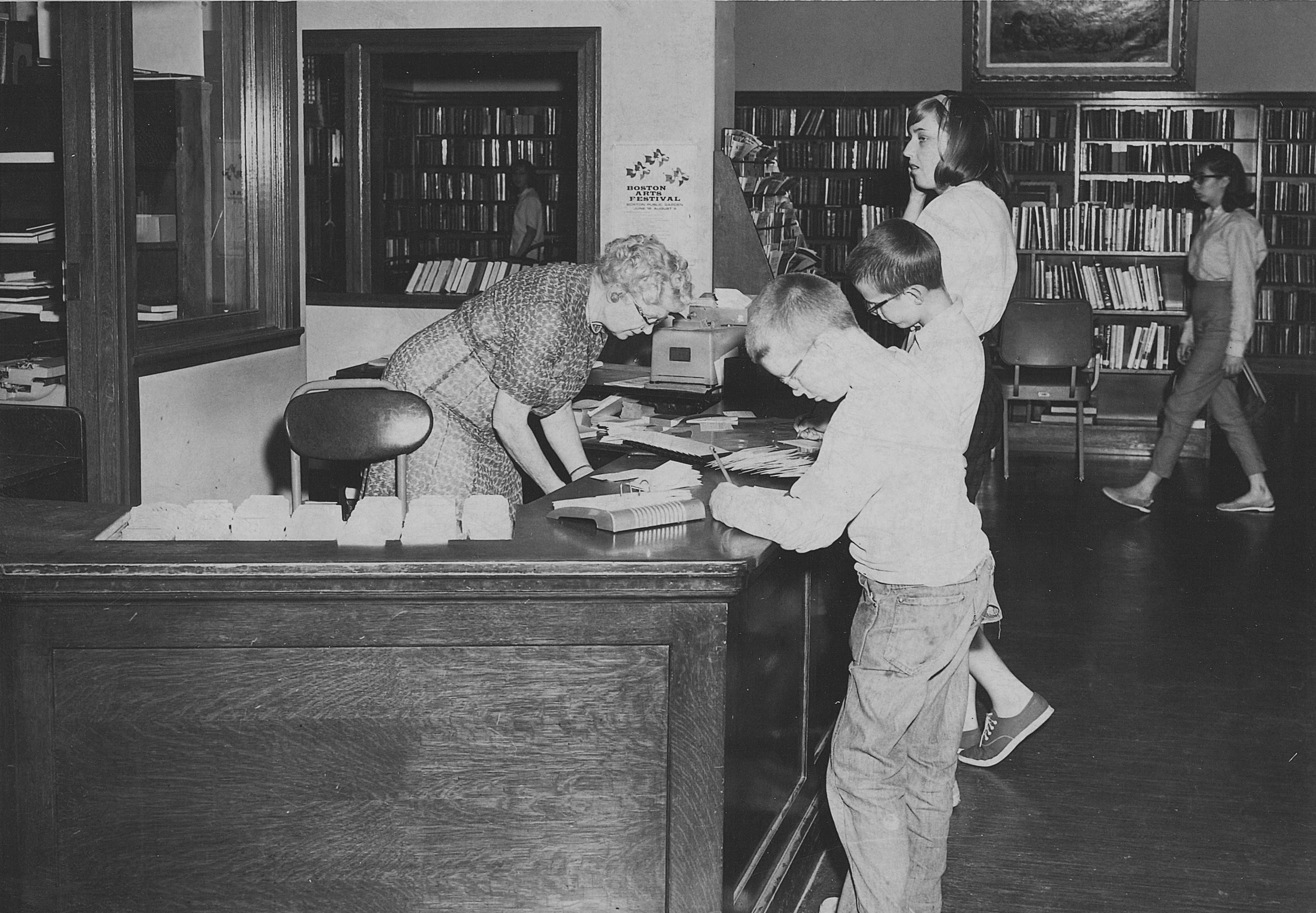 1964 Black and White photo of circulation desk at Weaver Memorial Library